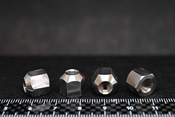チタン（TB340）材のCNC旋盤、切削加工にて六角ナット製品の加工事例になります。